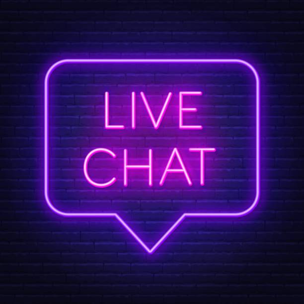 Een neon bord met de tekst 'LIVE CHAT' in felroze letters tegen een donkere achtergrond.